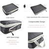 A set of reusable compression packing cubes in black and gray fabric showing various features like expansion and a hand strap