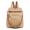 A tan leather backpack with brown accents and tassels shown from the back.