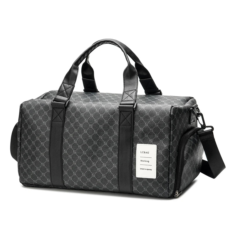A black duffle bag with leather trim and handles is shown from the side.