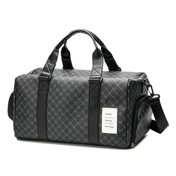 A black duffle bag with leather trim and handles is shown from the side.