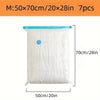 White reusable vacuum compression storage bag with a blue seal and measurement lines.