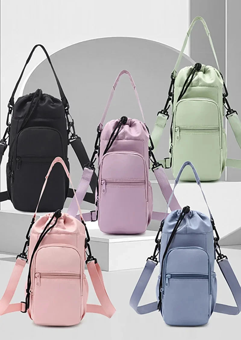 A collection of pink, purple, and blue adjustable strap thermal water bottle bags displayed against a white background.