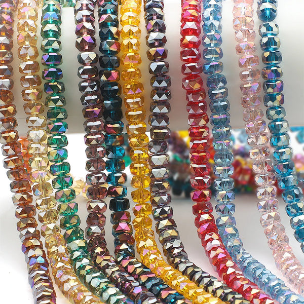 A collection of faceted crystal glass beads in various colors and shapes for jewelry making