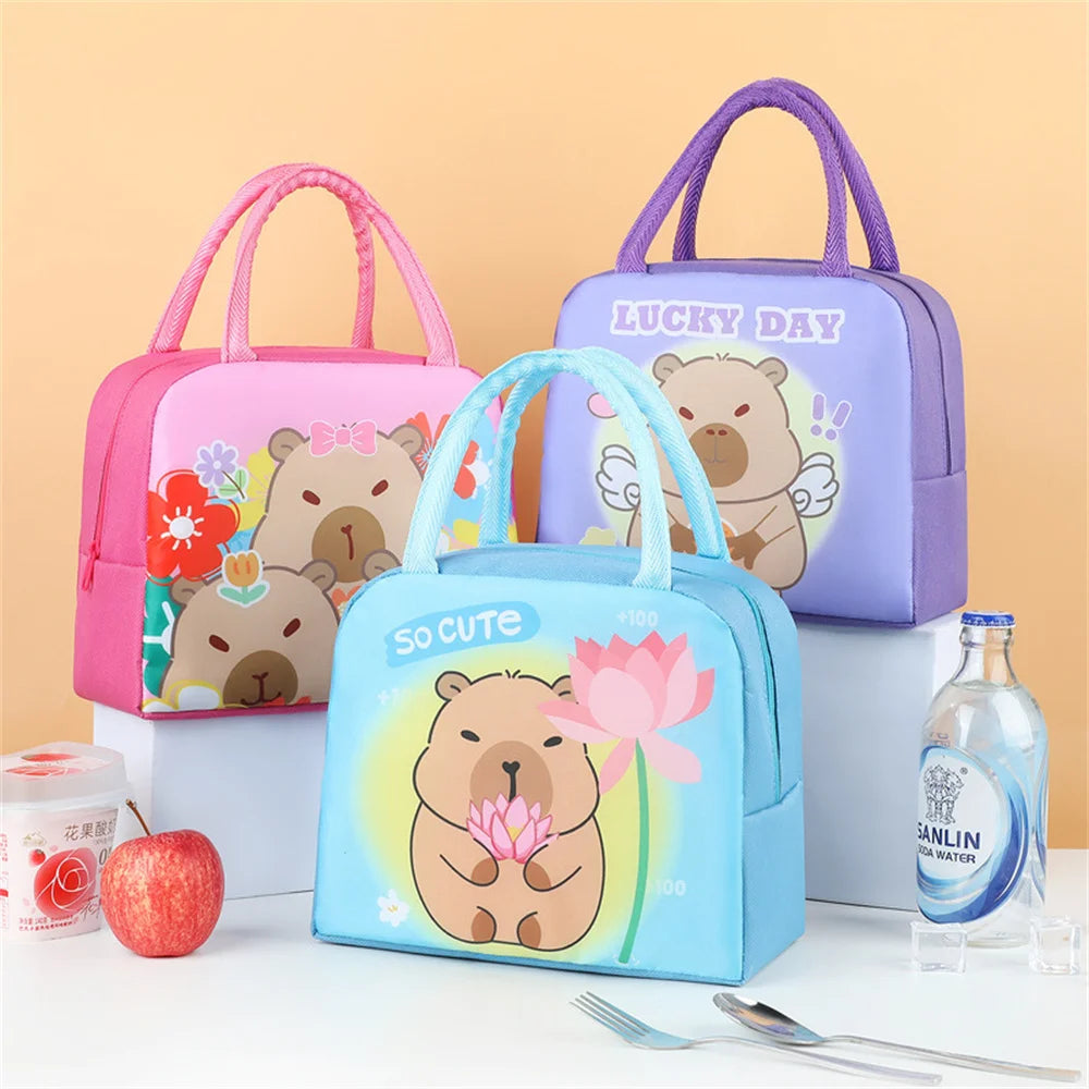 A set of pink and purple cartoon capybara insulated lunch bags with a lucky day theme.