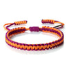 Handmade braided rope bracelet featuring vibrant purple and orange threads.