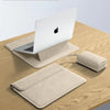 A beige premium PU laptop sleeve is shown next to an open Apple laptop on a wooden surface.