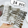 A collection of 24 silver metal star hairpins and clips are displayed on a white background.