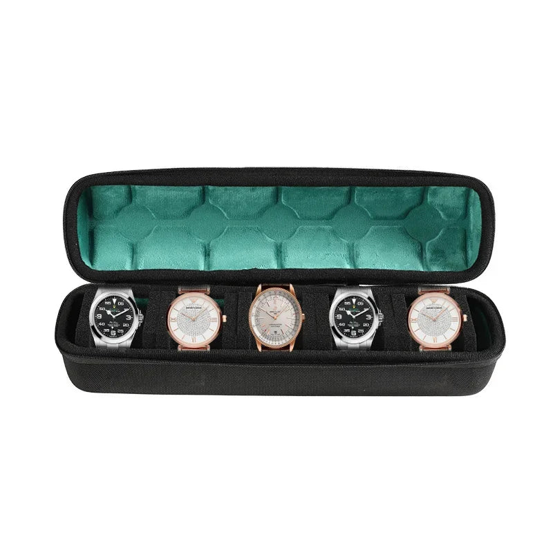 Black watch organizer case with a green soft lining holding four watches.