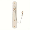 A beige vintage leather glove holder strap with brass hardware.