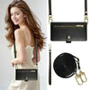 A woman models an elegant black leather crossbody phone case for iPhone.