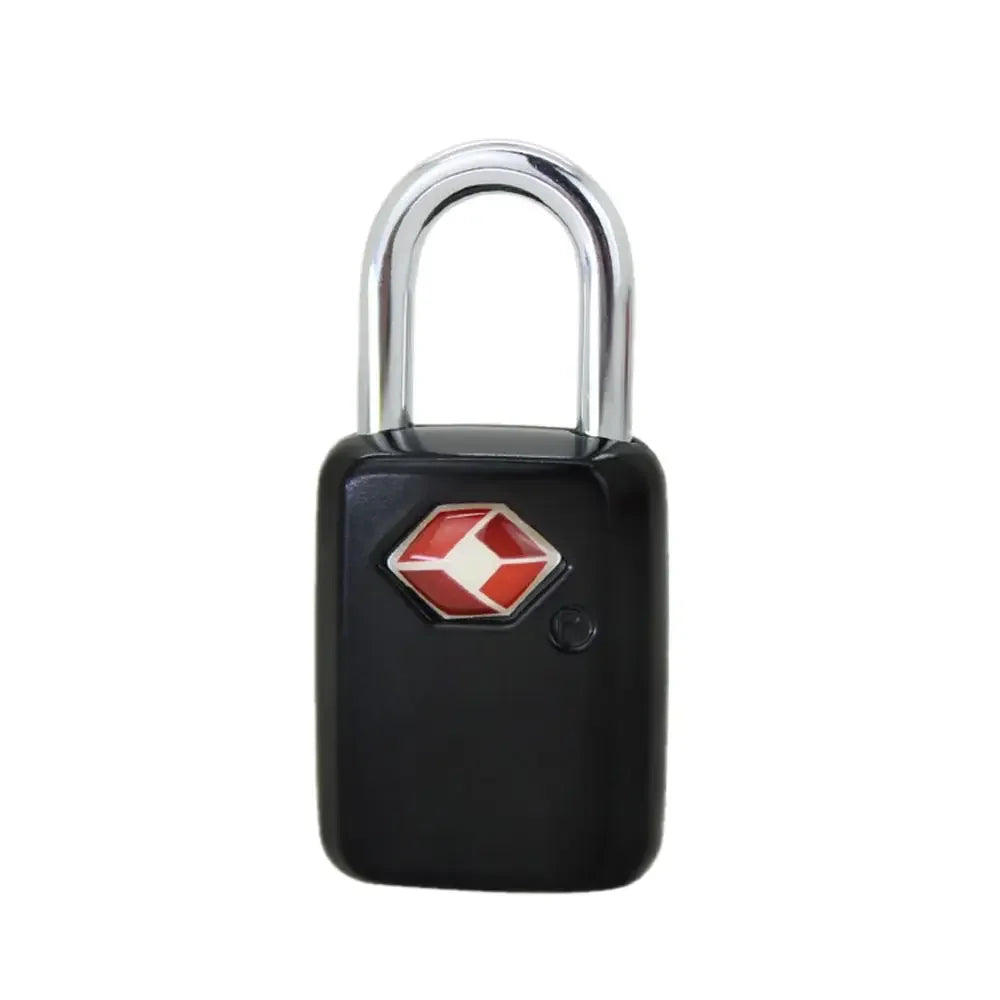 A black keyed luggage lock with a silver shackle and a red diamond emblem.