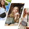 A woman models a chic black and white checkered nylon crossbody bag worn with a beige sweater.