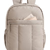 A light beige large capacity laptop backpack with padded straps and a zippered pocket.