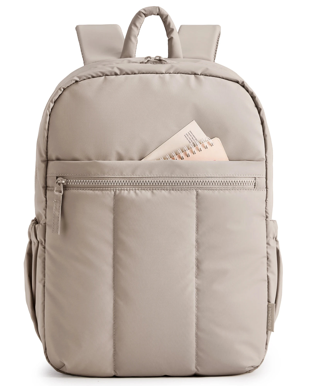 A light beige large capacity laptop backpack with padded straps and a zippered pocket.
