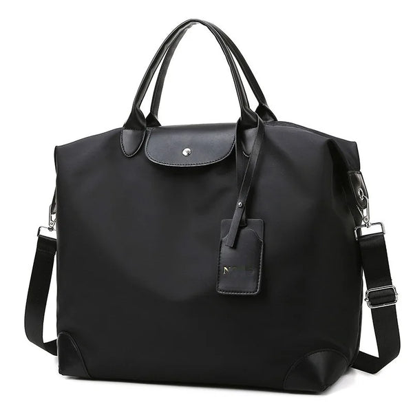 Maleta grande impermeable negra con asas y correas de cuero