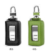 A pair of Korean style leather car key cases in black and green with transparent windows.