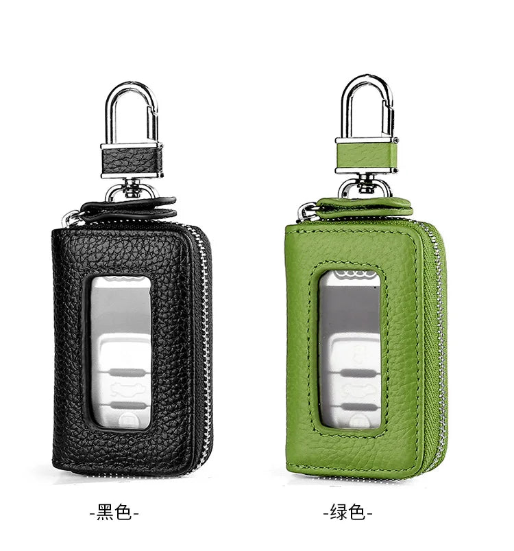A pair of Korean style leather car key cases in black and green with transparent windows.