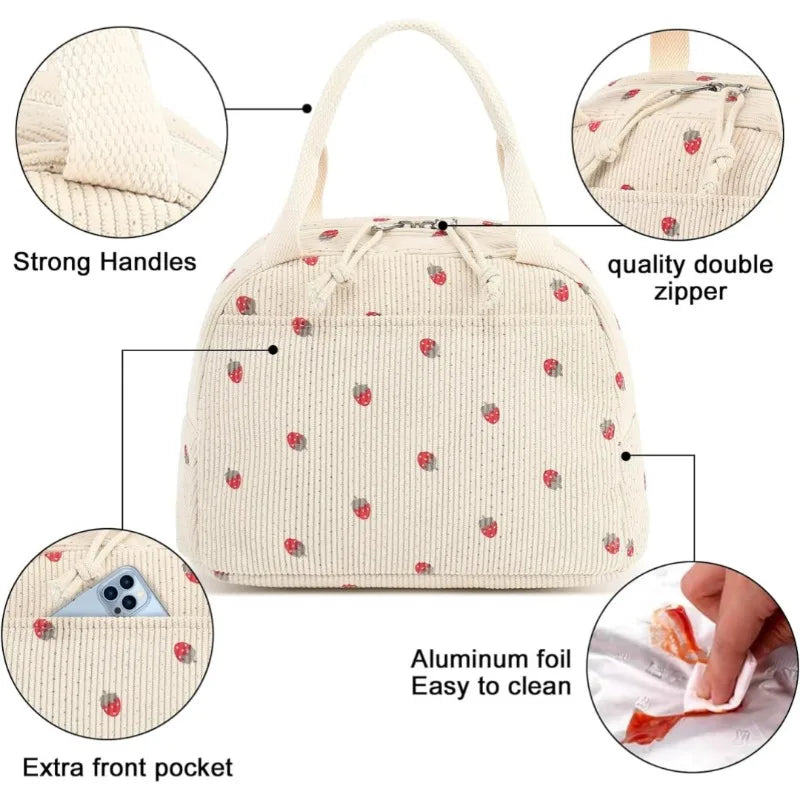 A cream-colored corduroy lunch bag with a textured pattern, featuring strong handles, a double zipper, and an extra front poc