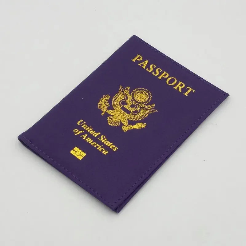 Purple leather passport holder with gold embossed eagle design and United States of America text