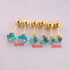 A set of gold-toned stainless steel ear stud earrings in various sizes, measuring 5mm, 4mm, and 3mm.