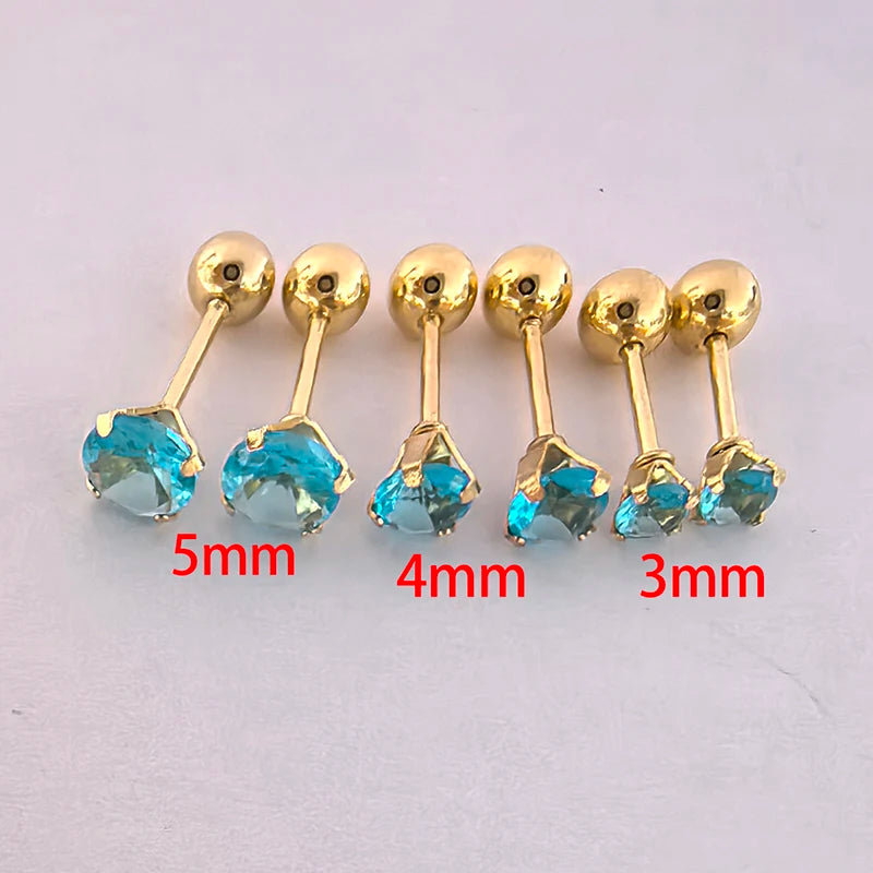 A set of gold-toned stainless steel ear stud earrings in various sizes, measuring 5mm, 4mm, and 3mm.
