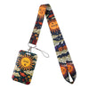 A patterned lanyard featuring a sun design on a key ring for ID badges and keys.