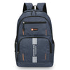 A dark blue men's lightweight commuter backpack with black and orange accents.