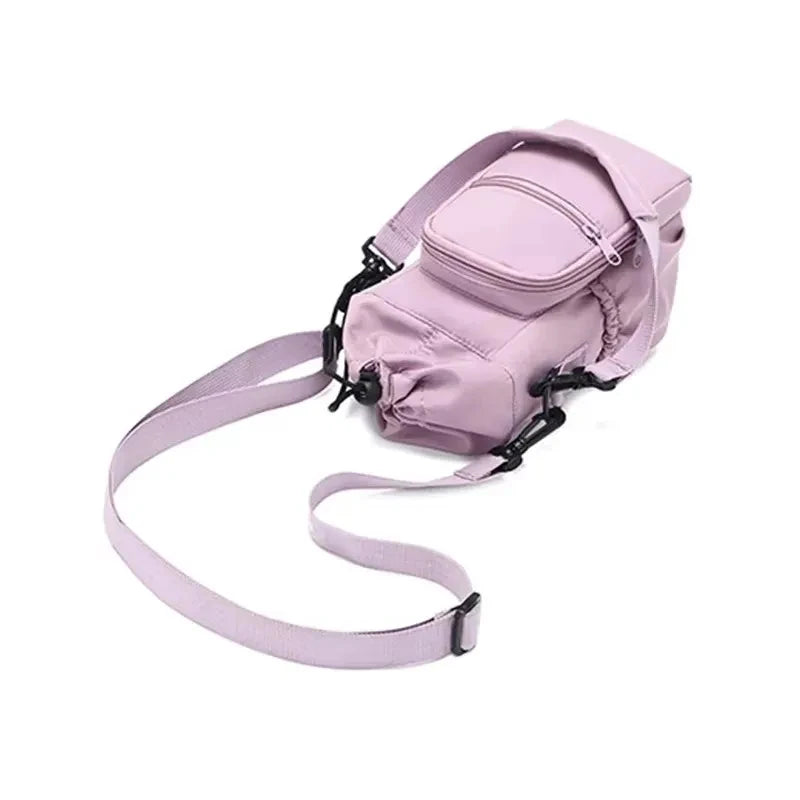 A pink adjustable strap thermal water bottle bag with a padded compartment and strap.