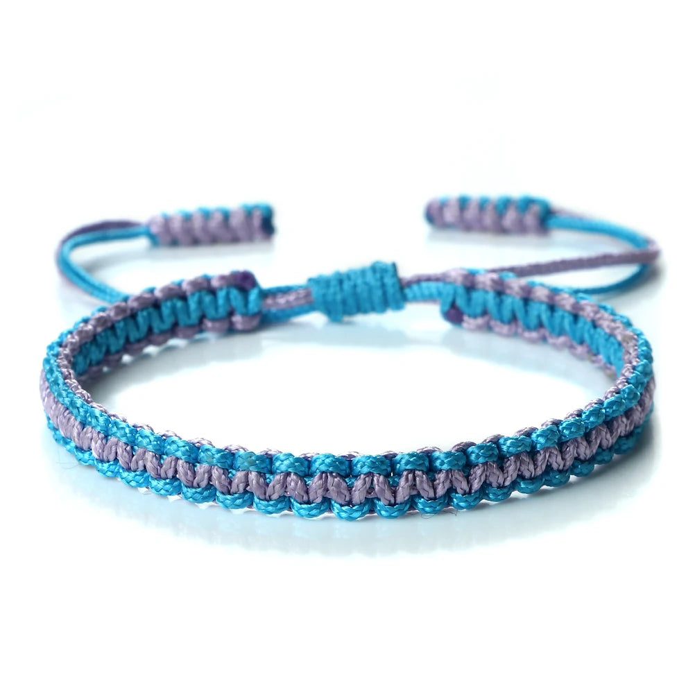Handmade braided rope bracelet featuring purple and blue threads.