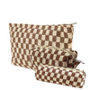 A set of three checkered makeup bags in brown and beige tones.