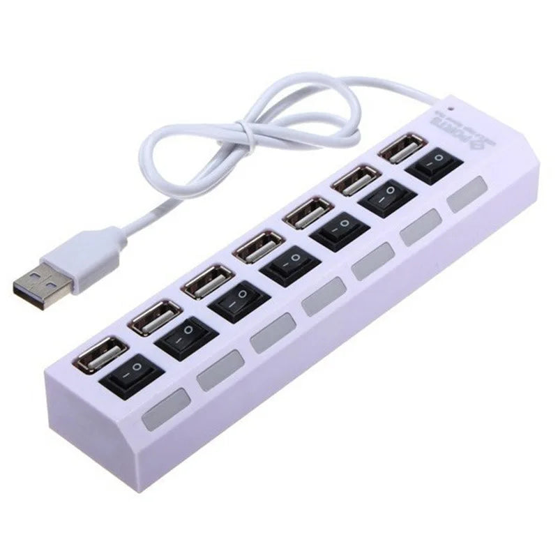 A white 7-port USB splitter hub with on/off switches and a white cable.