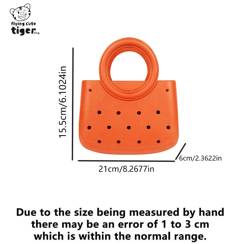 Orange round PVC handbag with a DIY hole design and a loop handle