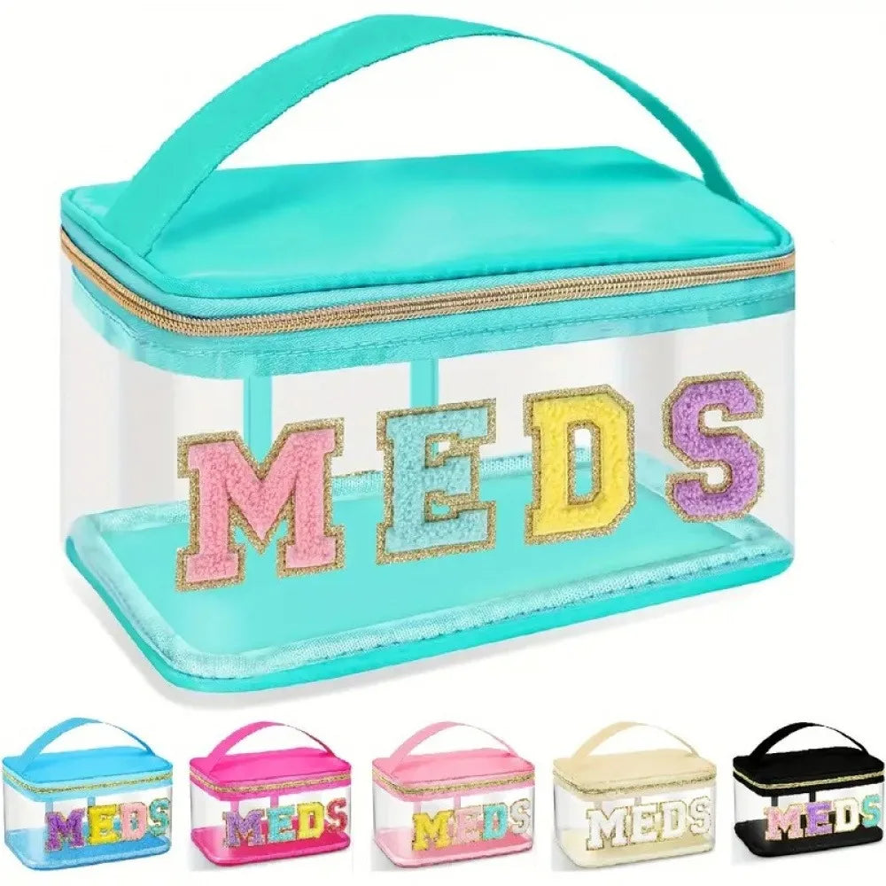 A set of clear toiletry bags with personalized letters MEDS in various colors including pink, yellow, and black.