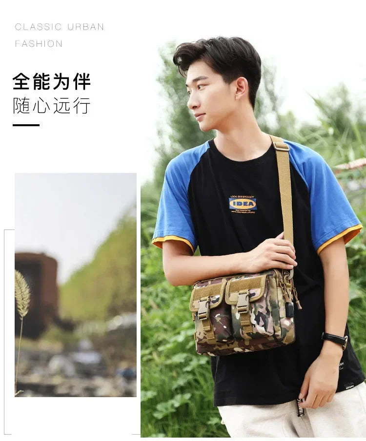 A young man wearing a black t-shirt and light pants holds a camouflage tactical fanny pack outdoors.