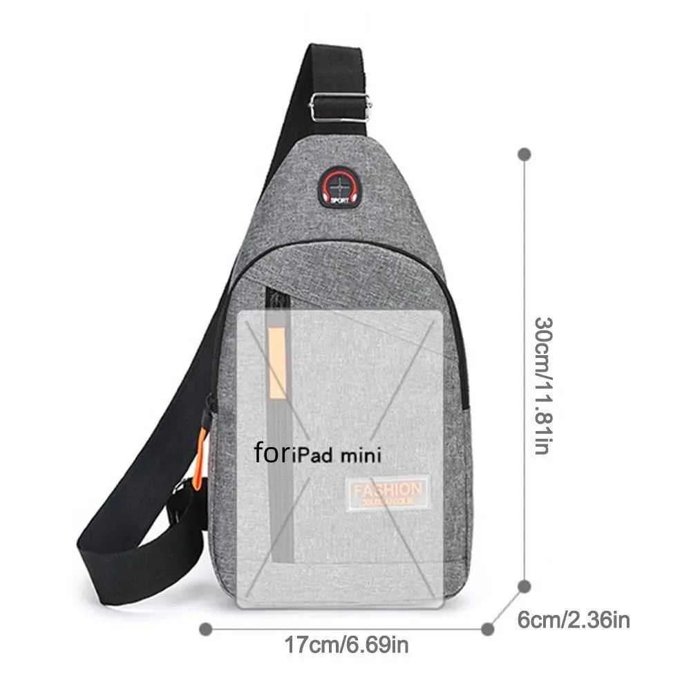 A gray and black mini backpack featuring a laptop sleeve and adjustable strap.