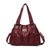 Maroon Vintage weiches PU-Leder-Schultertasche mit Klappverschluss und Lederbesatz.