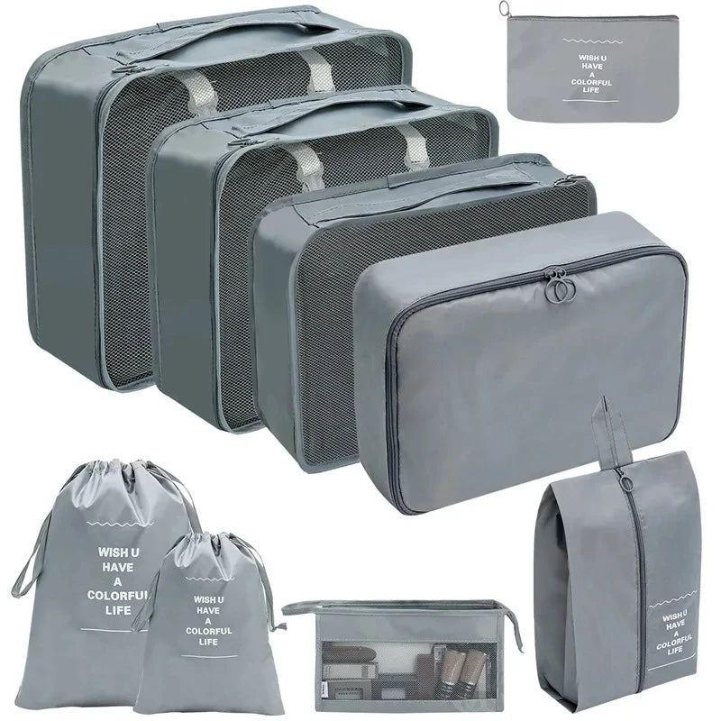A set of gray fabric storage organizers and pouches for organizing various items.