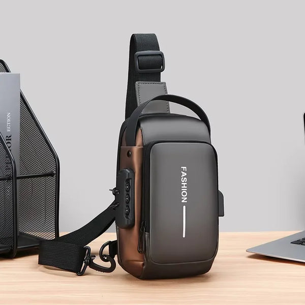 A dark brown men's Oxford sling chest bag with a padded phone pocket and black strap resting on a wooden surface.