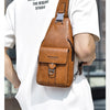 A man wearing a white t-shirt displays a brown PU leather belt sling chest bag on his torso.