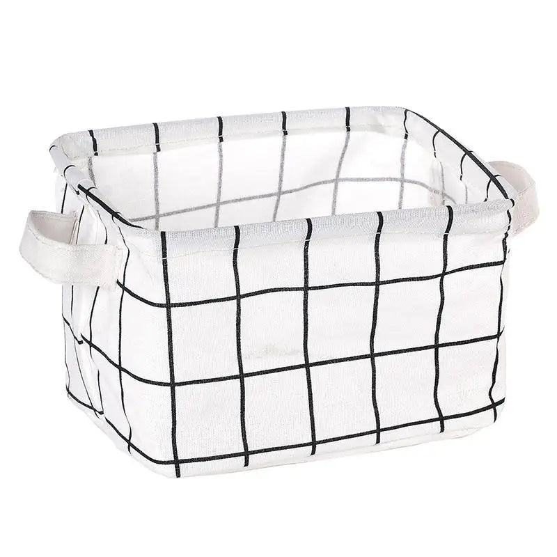A white and black checkered storage basket made of cotton linen for desk organization.