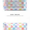 A colorful patchwork cosmetic storage pouch featuring various pastel and bright colored squares.