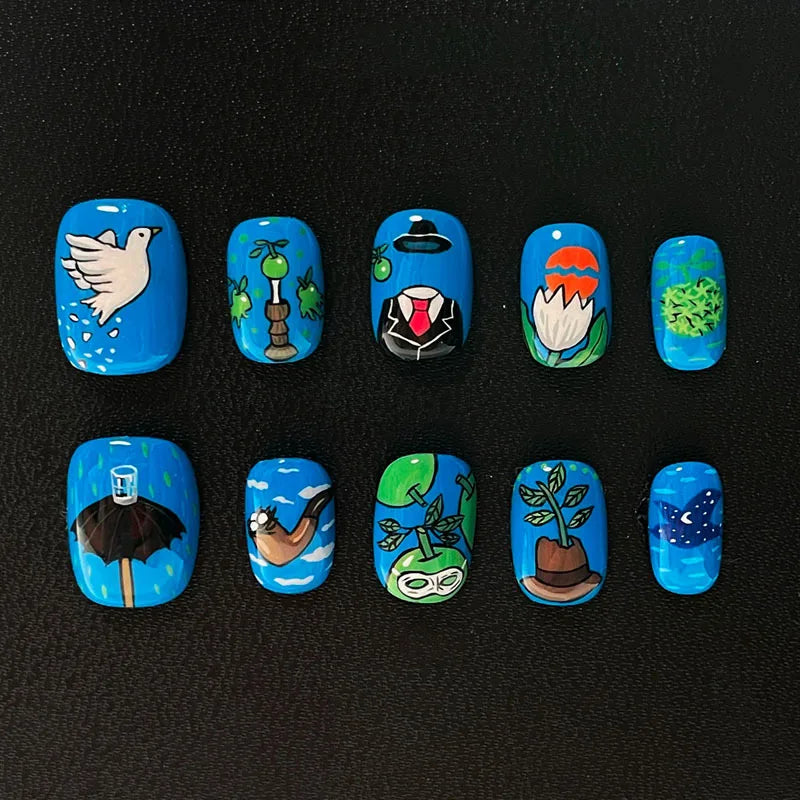A set of 12 cute cartoon press-on nails featuring various animal and nature themes in blue and green colors.