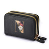 Black mini wallet with a floral letter print and gold zipper details