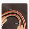 A close-up of a brown leather bag strap showing the consistent tone and edge details.