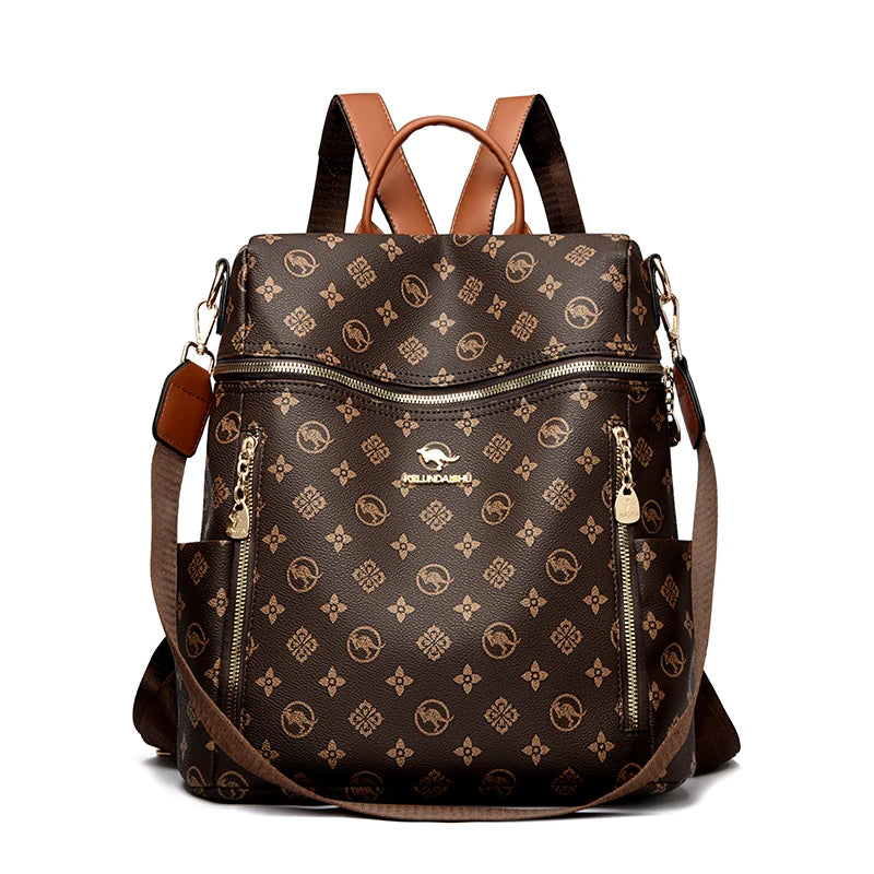A brown genuine leather women's backpack with a monogram pattern and tan leather straps.