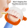 A close-up of an orange hand sucker teether with a bunny design being held by a baby's hand.