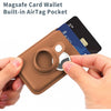 A brown MagSafe card wallet with a built-in pocket for an AirTag is shown being held by a hand.