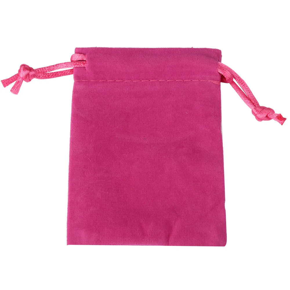 Bolsa de regalo de terciopelo magenta con cordones rosas.