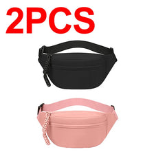 Two anti-theft waist packs, one black and one pink, shown from the front.