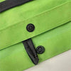 A bright lime green foldable grocery and shopping cart with black accents.